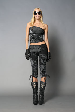 model wearing black print soft jersey tbe top with ruching detail on the sides