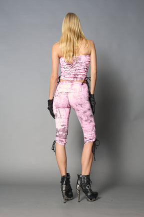 model wearing pink print soft jersey tbe top with ruching detail on the sides