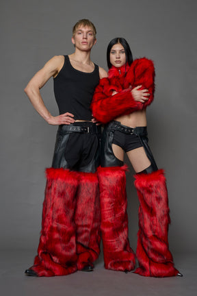 model wearing red vegan leather and faux fur chaps