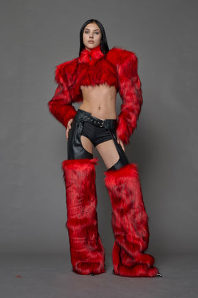 model wearing red vegan leather and faux fur chaps