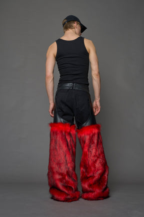 model wearing red vegan leather and faux fur chaps