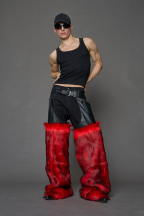 model wearing red vegan leather and faux fur chaps