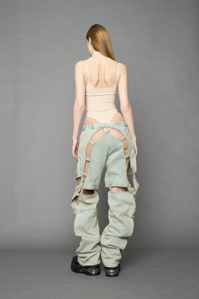 beige contour body by NAMILIA featuring a sculpted fit, corset-style waist with hook-and-eye closure, and high neckline. Statement bodywear.