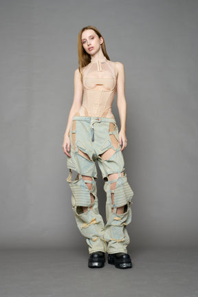 beige contour body by NAMILIA featuring a sculpted fit, corset-style waist with hook-and-eye closure, and high neckline. Statement bodywear.