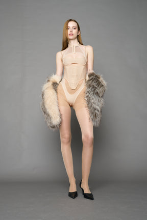 beige contour body by NAMILIA featuring a sculpted fit, corset-style waist with hook-and-eye closure, and high neckline. Statement bodywear.