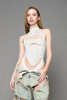 white contour body by NAMILIA featuring a sculpted fit, corset-style waist with hook-and-eye closure, and high neckline. Statement bodywear.