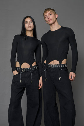 Female and male model wearing a form fitted lingerie-inspired black longsleeve with garter belt detail
