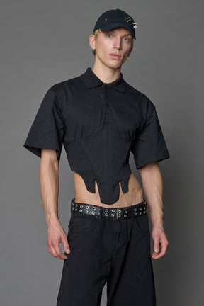 Model wearing a Polo shirt inspired black corset with lacing on the back