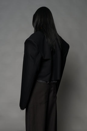 Black Namilia cropped blazer with oversized padded shoulders, single button closure and boxy silhouette