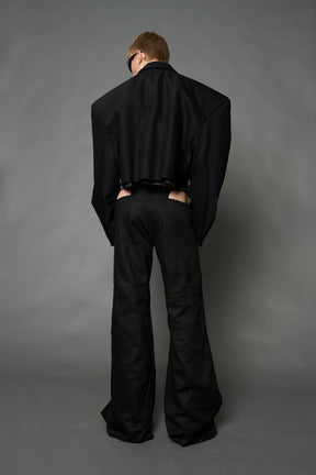 Black Namilia cropped blazer with oversized padded shoulders, single button closure and boxy silhouette