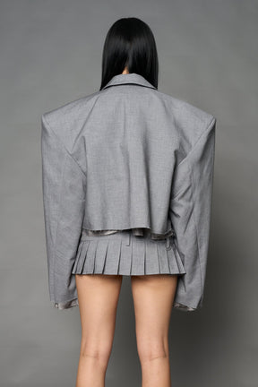 Grey Namilia cropped blazer with oversized padded shoulders, single button closure and boxy silhouette