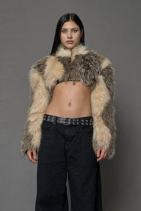 brown cropped faux fur jacket with exaggerated shoulders and high neck – bold statement outerwear for nightlife, streetwear, or runway looks.