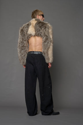 brown cropped faux fur jacket with exaggerated shoulders and high neck – bold statement outerwear for nightlife, streetwear, or runway looks.