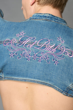 Namilia blue cropped denim bolero jacket with exaggerated shoulders and pink embroidery on back