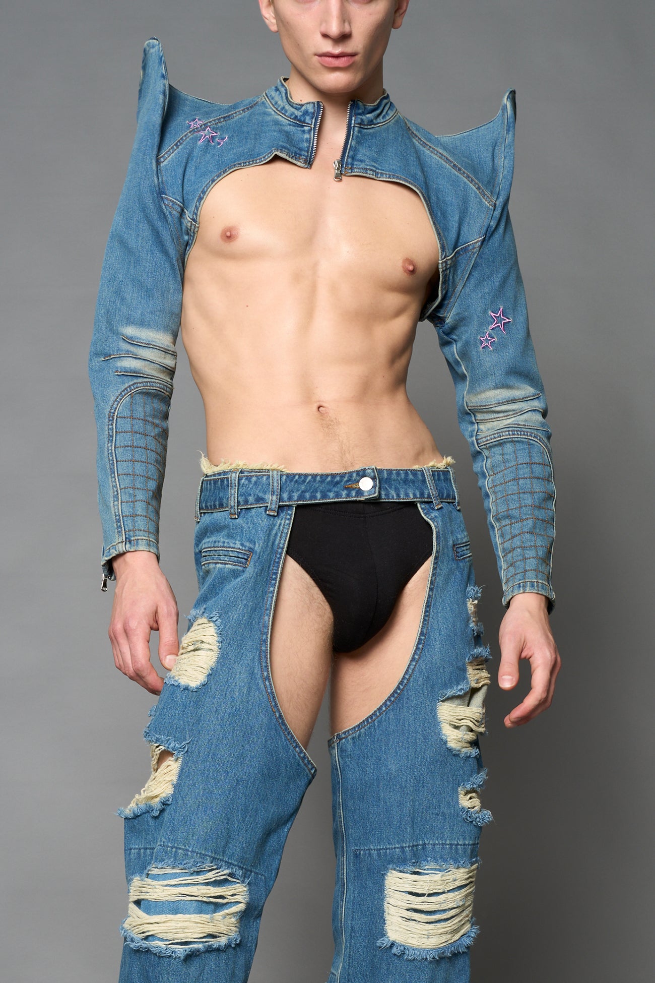 Namilia blue cropped denim bolero jacket with exaggerated shoulders and pink embroidery on back