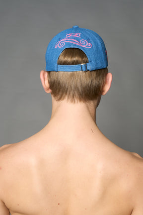 Blue denim baseball cap with pink rhinestone embroidery, butterfly graphic and distressed brim – Namilia