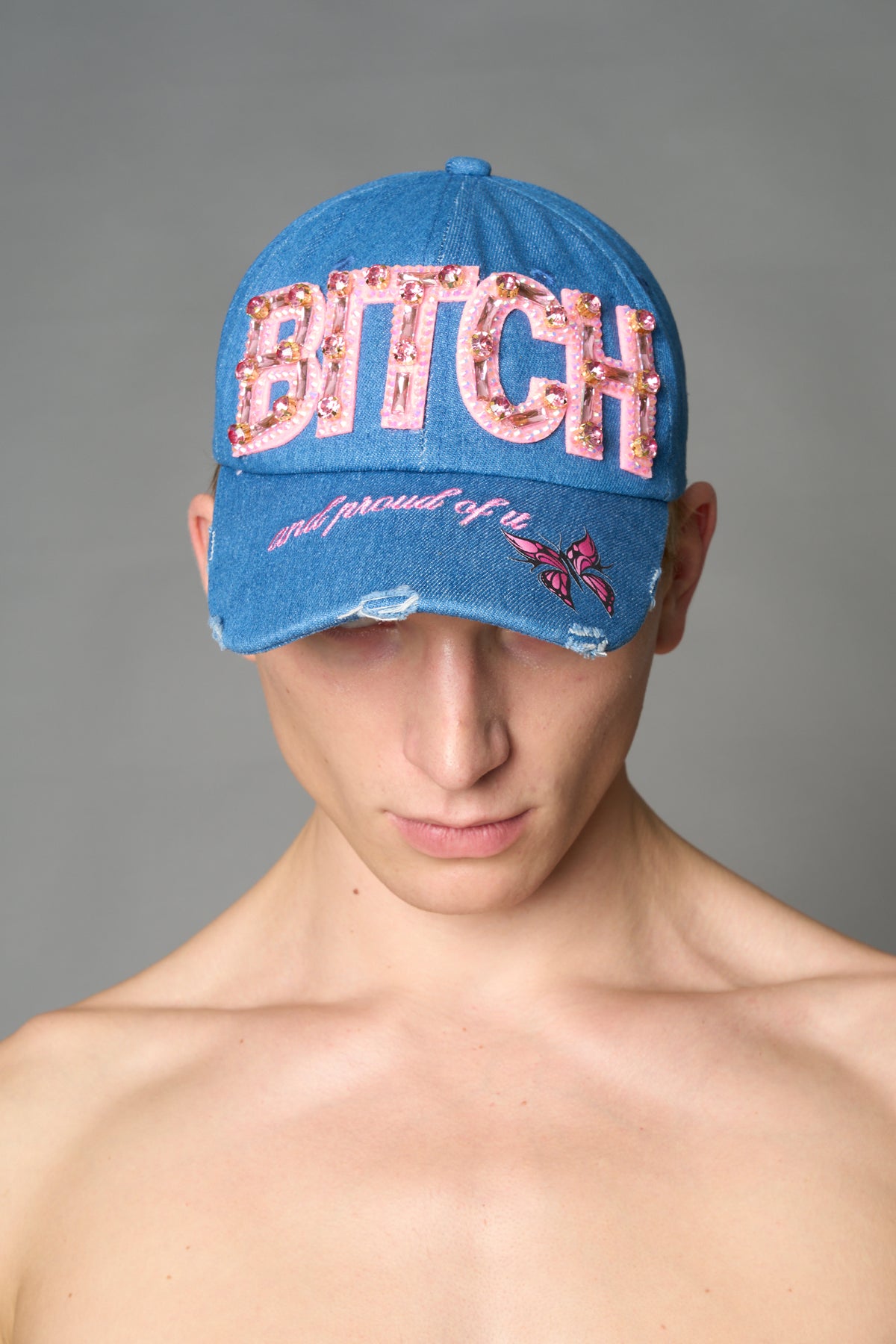 Blue denim baseball cap with pink rhinestone embroidery, butterfly graphic and distressed brim – Namilia