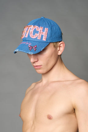 Blue denim baseball cap with pink rhinestone embroidery, butterfly graphic and distressed brim – Namilia