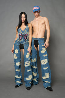 Namilia shredded blue denim chaps with low-rise fit, extreme thigh cut-outs and distressed straight legs