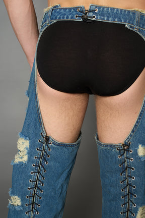 Namilia shredded blue denim chaps with low-rise fit, extreme thigh cut-outs and distressed straight legs