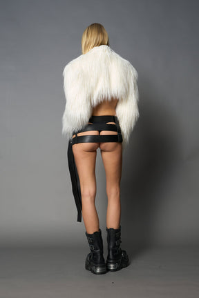 white cropped faux fur jacket with exaggerated shoulders and high neck – bold statement outerwear for nightlife, streetwear, or runway looks.