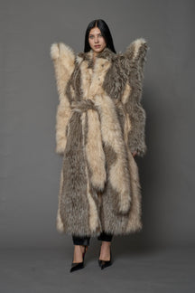 model wearing brown spike shoulder long faux fur coat