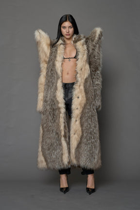 model wearing brown spike shoulder long faux fur coat