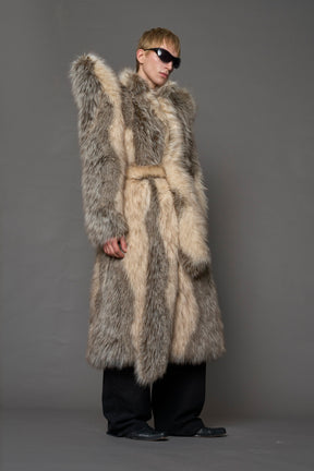 model wearing brown spike shoulder long faux fur coat