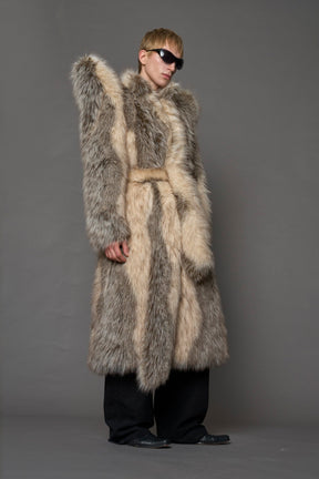 model wearing brown spike shoulder long faux fur coat