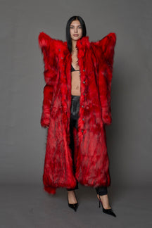 model wearing red spike shoulder long faux fur coat
