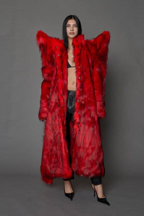 model wearing red spike shoulder long faux fur coat