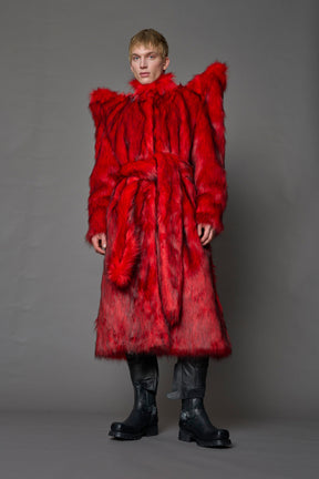 model wearing red spike shoulder long faux fur coat