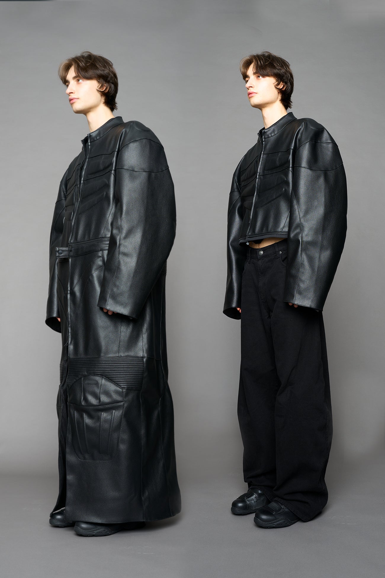 Detachable moto long coat in black vegan black leather inspired by a deconstructed full-body motocross racing suit, featuring padded panel details and a detachable zip design for two-way wear.