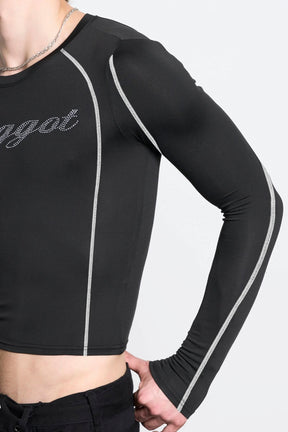 male model wearing black lycra longsleeve with rhinestone crystal slogan