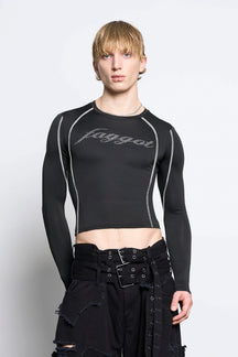male model wearing black lycra longsleeve with rhinestone crystal slogan
