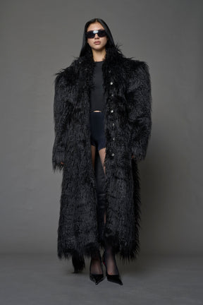 black faux fur coat with shoulder pads and  belt