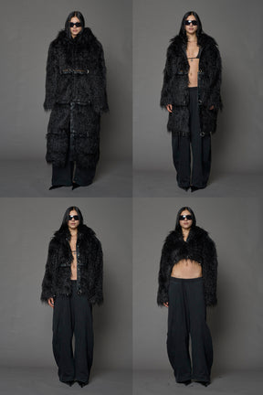 model wearing black faux fur coat with silver metal rings