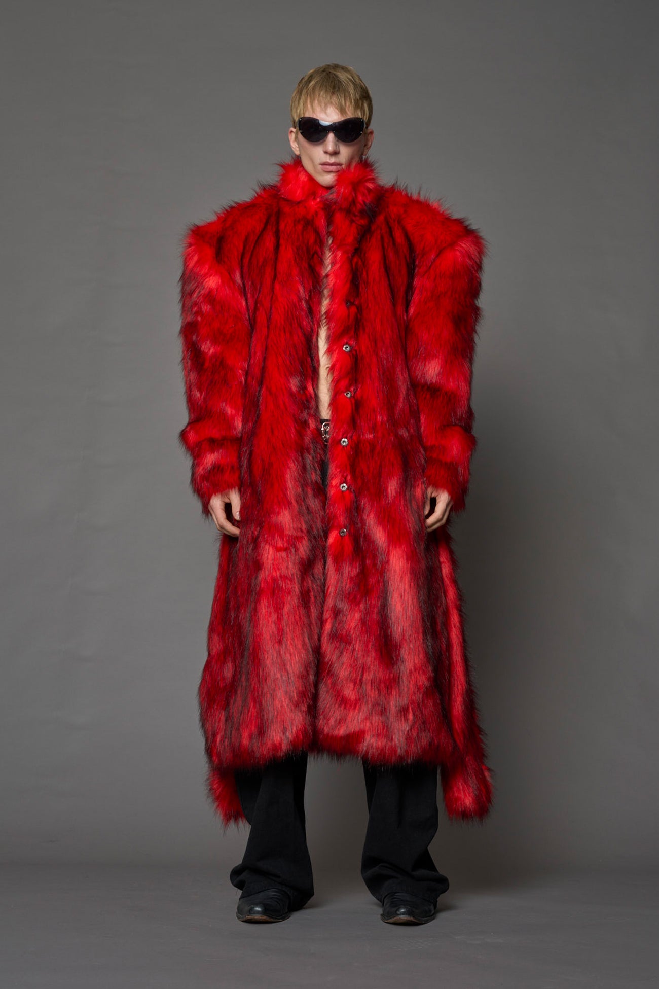 red faux fur coat with shoulder pads and  belt