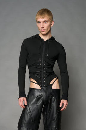 Black Namilia zip-up hoodie with built-in corset, lace-up front, cut-out sides and drawstring hood