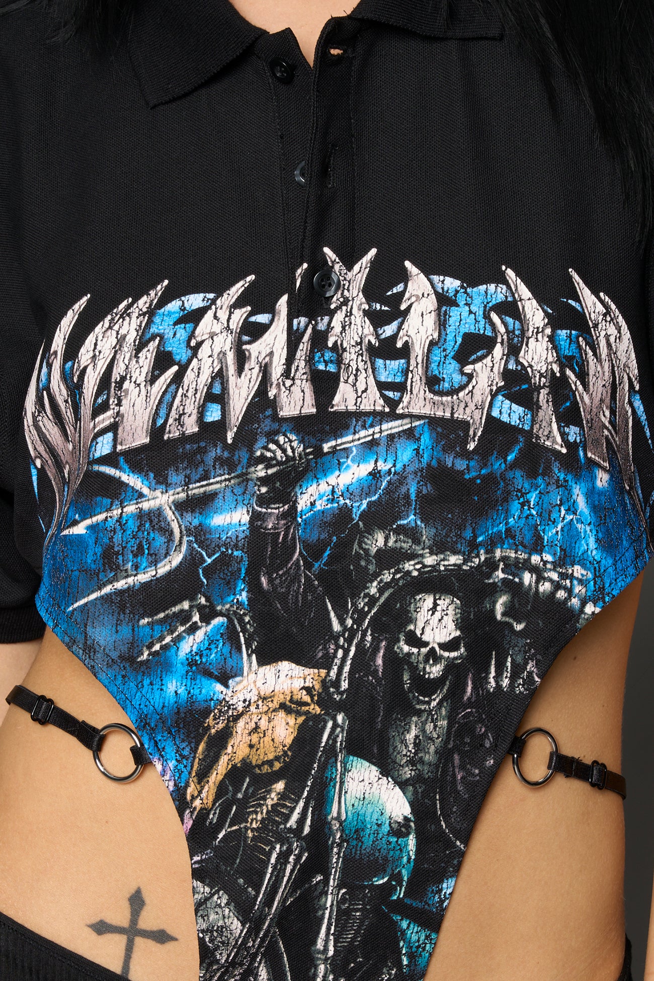Black Namilia polo bodysuit with biker graphic print, cut-out sides, O-ring strap details and thong back with X logo