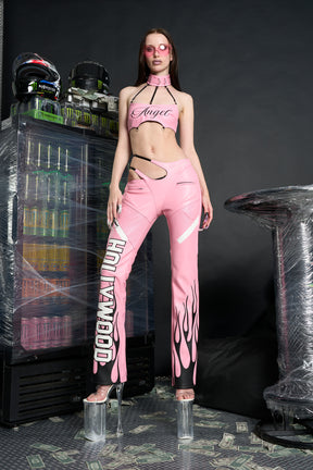 Namilia ‘Angel Choker Top’ – edgy vegan leather bandeau top with adjustable collar, cursive 'Angel' graphic, mesh panels, chrome hardware, and elastic back straps. pink version
