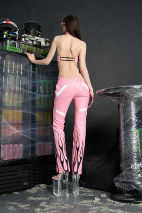 Namilia ‘Angel Choker Top’ – edgy vegan leather bandeau top with adjustable collar, cursive 'Angel' graphic, mesh panels, chrome hardware, and elastic back straps. pink version