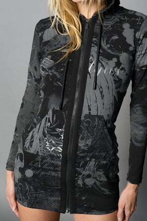 model wearing black print soft jersey short dress with hood and backless cut out