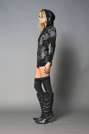 model wearing black print soft jersey short dress with hood and backless cut out