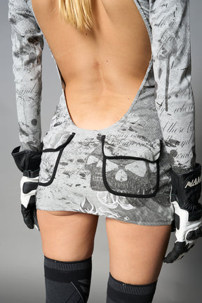 model wearing grey print soft jersey short dress with hood and backless cut out