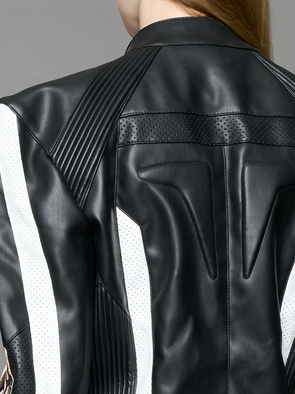 black motocross vegan leather jacket with embroidered sleeve