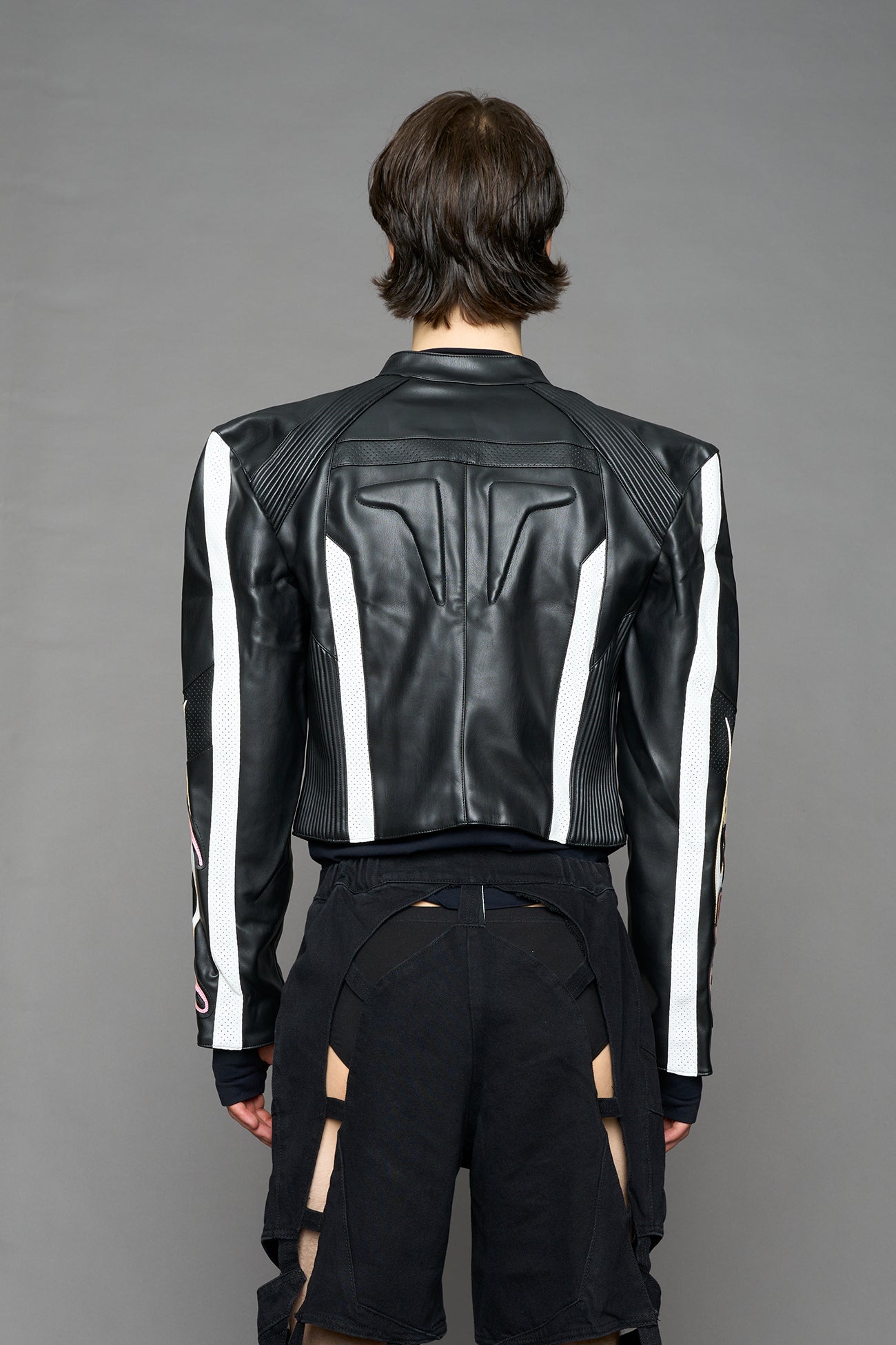 black motocross vegan leather jacket with embroidered sleeve