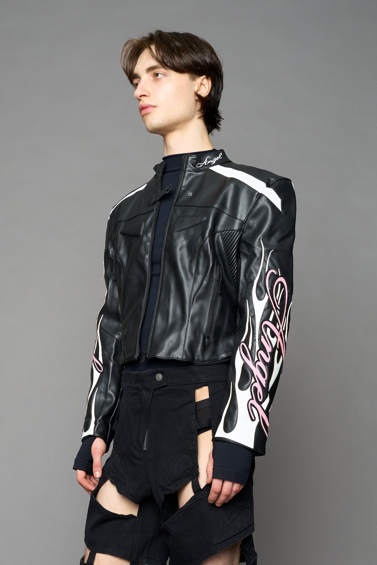 black motocross vegan leather jacket with embroidered sleeve