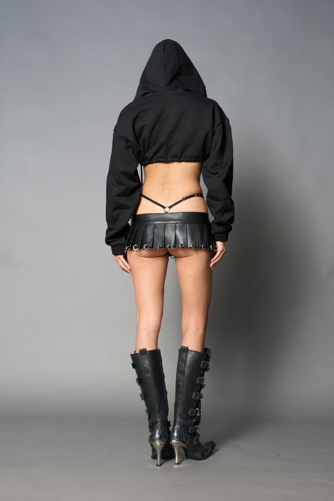 model wears black sweat hoodie body with drawstring closure