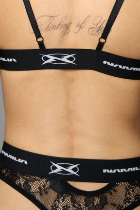 Black Namilia lace thong with floral mesh, logo waistband and cut-out details on front and back